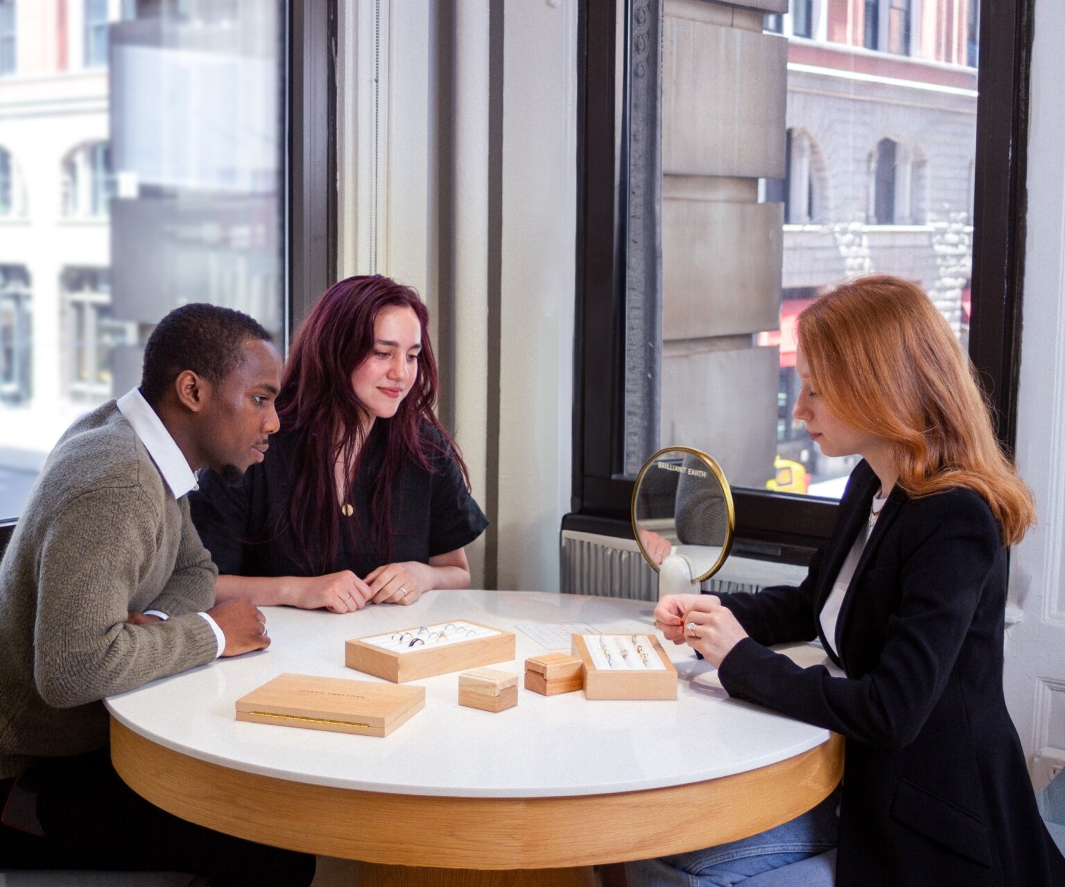 Group of Brilliant Earth employees working at a showroom